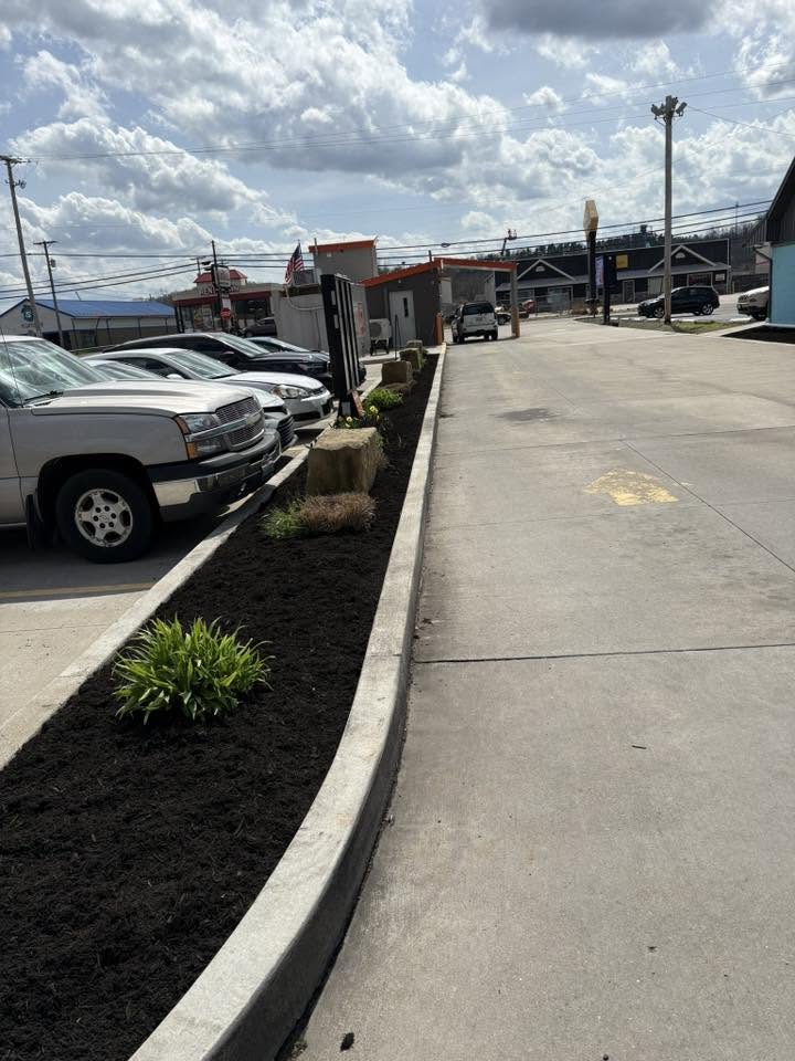 Commercial landscaping with fresh mulch and plantings