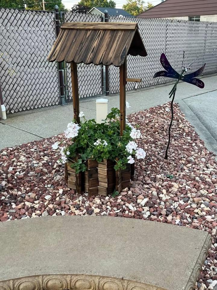 Custom wooden wishing well planter with flowers
